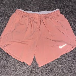 LIKE NEW pink Nike dri fit running shorts